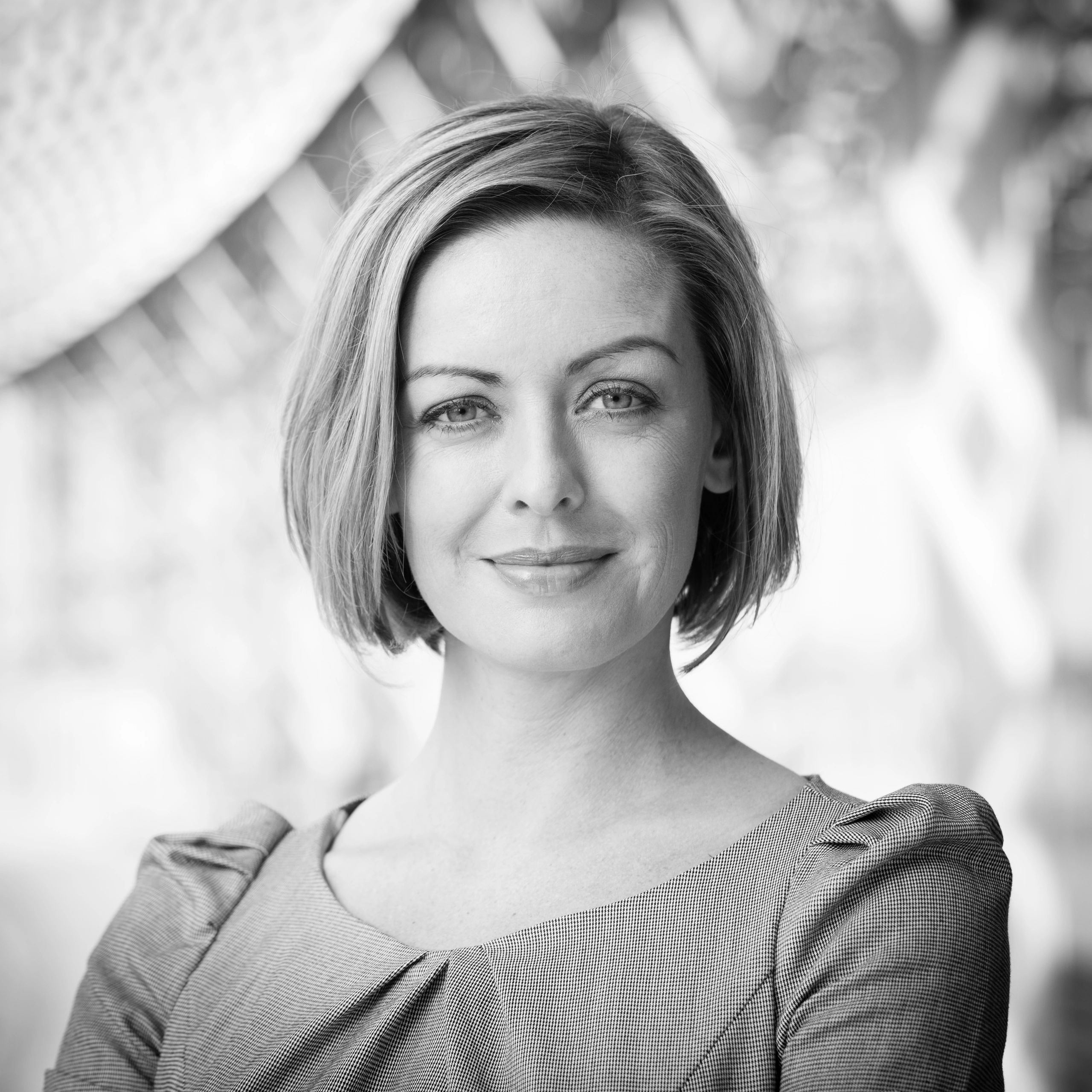 Professional headshot for testimonial author